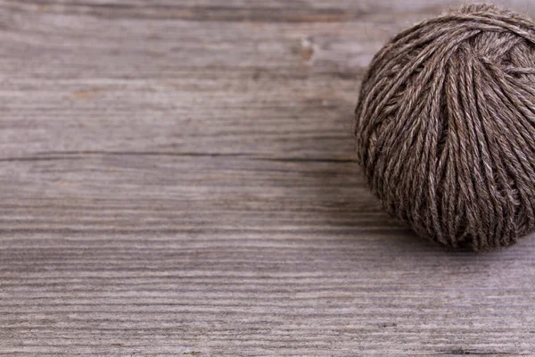 Wool yarn on wood — Stock Photo, Image