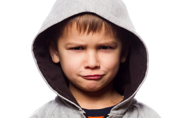 Criança fazendo expressões engraçadas, ele está triste — Fotografia de Stock