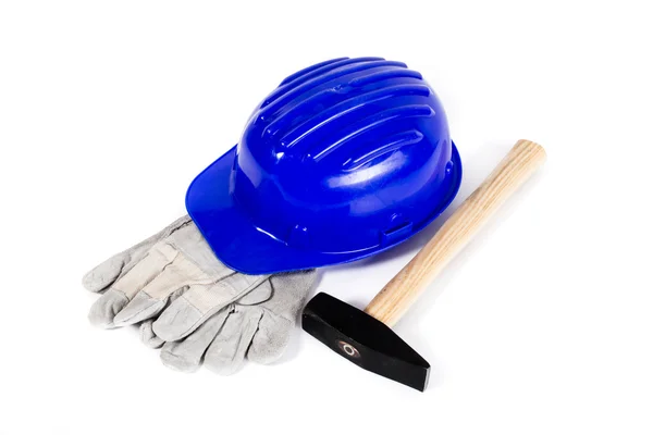 Hard hat, glove and hammer — Stock Photo, Image