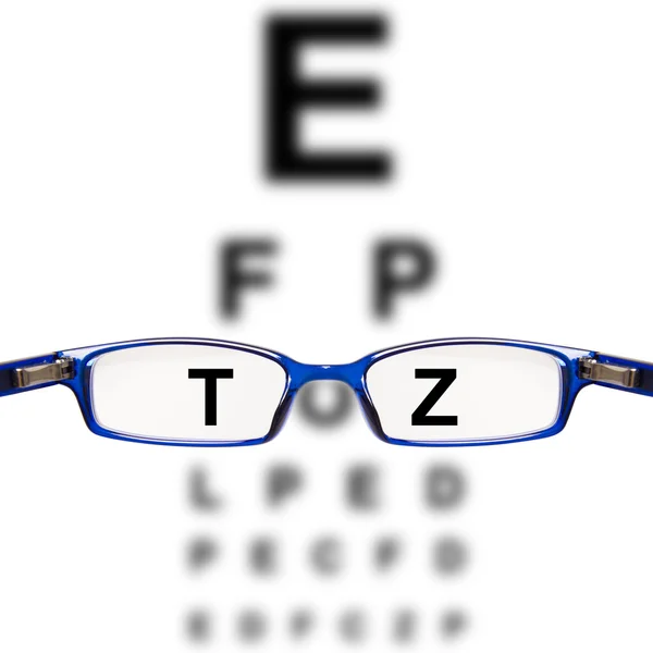 Sight test seen through eye glasses — Stock Photo, Image