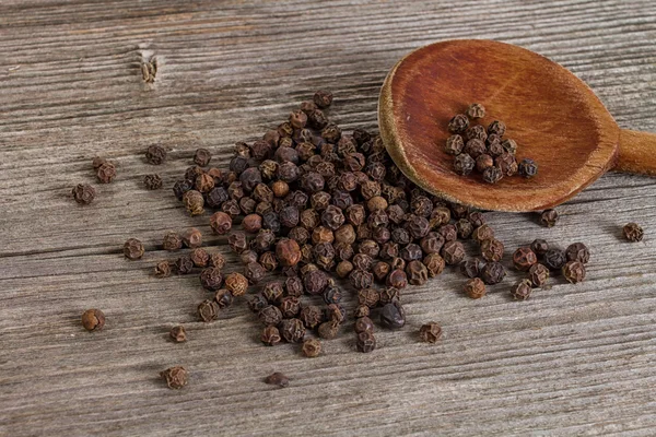 Pepper on wood — Stock Photo, Image