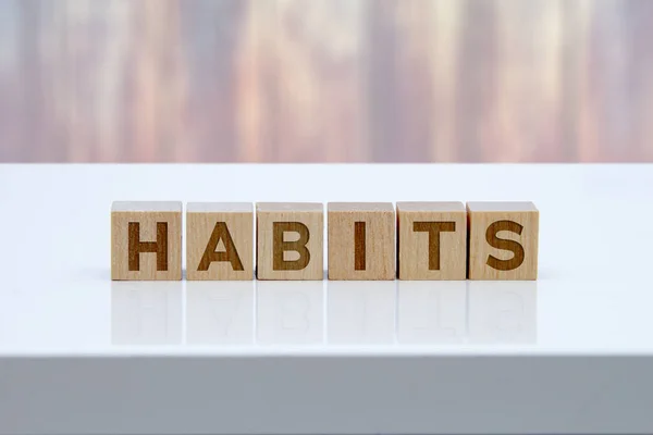 Habits Message Sign Wooden Blocks Sitting White Table Wooden Wall — Stock Photo, Image