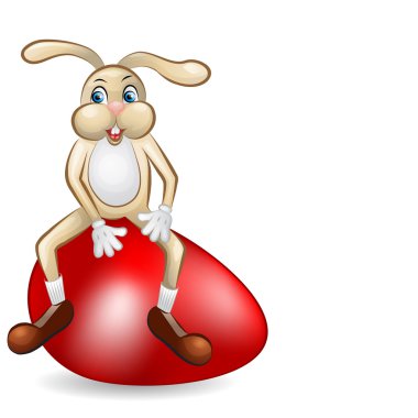 Kırmızı Dev yumurta üzerinde oturan Paskalya tavşanı