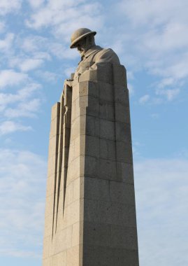 WW1 Canadian Brooding Soldier Memorial, St Julien, near Ypres in Belgium, marking spot where poison gas was used against Canadian soldiers in the Second Battle of Ypres, April 1915 clipart