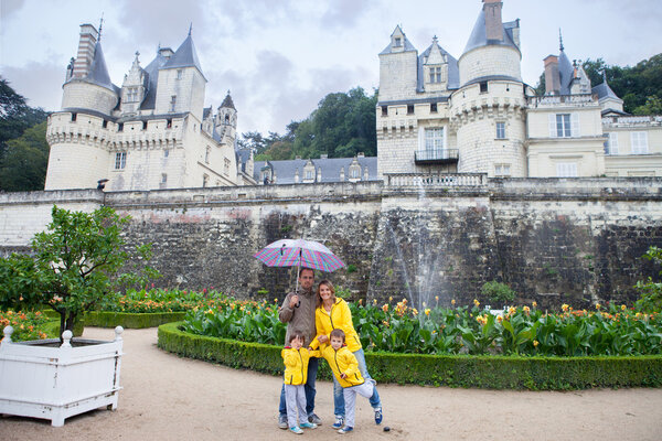 Beautiful family of four in front of Usse Castle, Indre-et-Loire