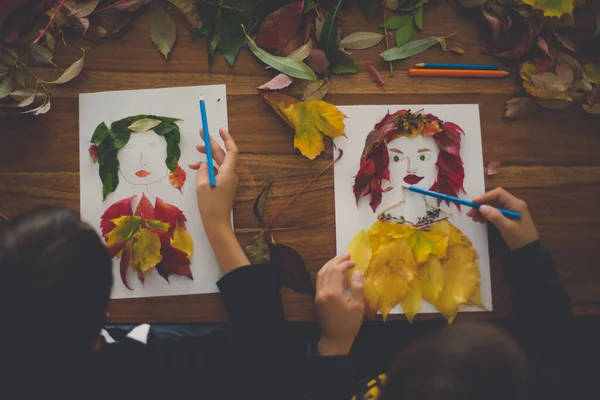 Child Creating Woman Portrait Leaves Living Room Applying Leaves Using — Stock Photo, Image