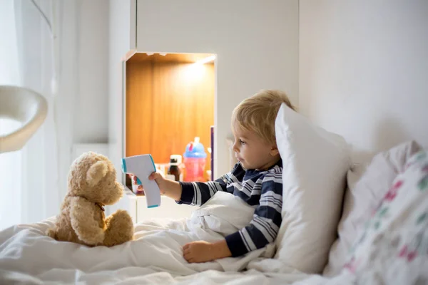 Little Toddler Blond Child Playing Teddy Bear Bed While Being — Stock Photo, Image