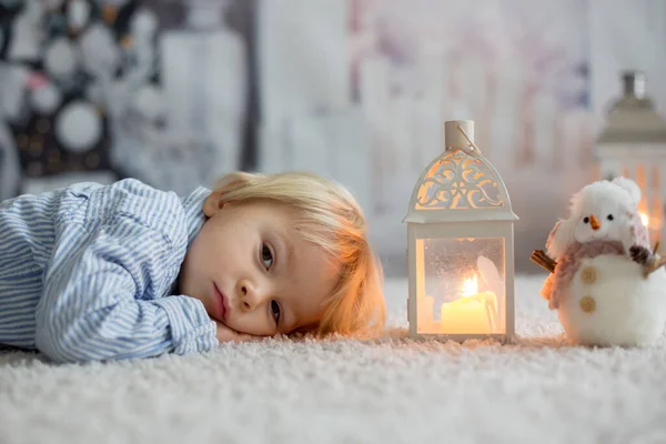 Sweet Toddler Boylying Floor Home Candles Waiting Christmas Night — Stock Photo, Image