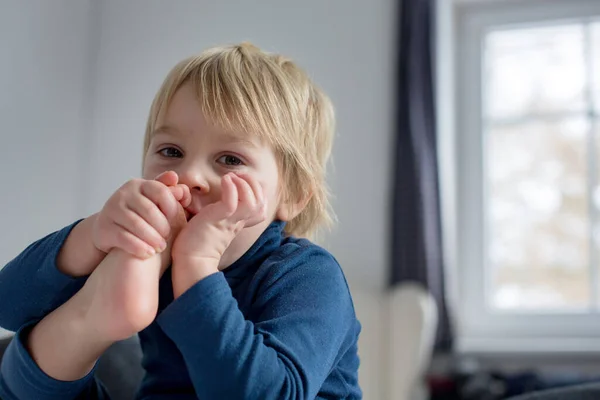 Cute Blond Toddler Child Sucking His Foot Thumb Making Funny — Stock Photo, Image