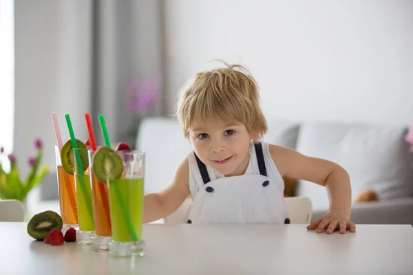 Cute Toddler Child Blond Boy Drinking Freshly Made Fruit Juice — Stock Photo, Image