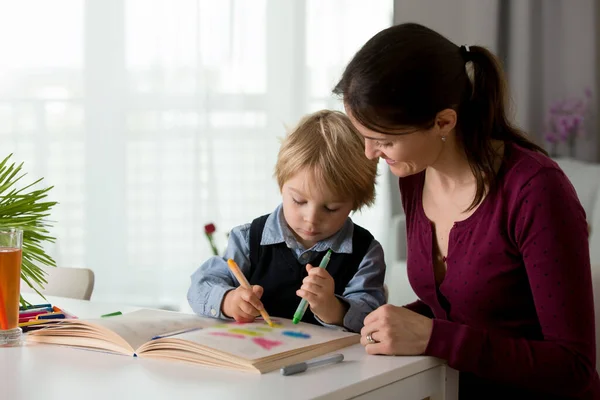 Cute Preschool Child Blond Boy Filling Some Homework Work Book — Stock Photo, Image