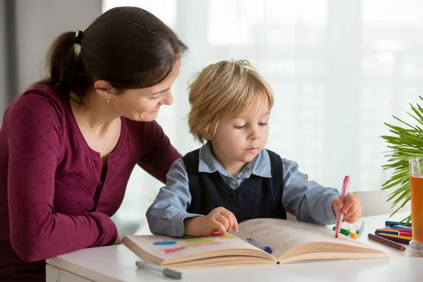 Cute Preschool Child Blond Boy Filling Some Homework Work Book — Stock Photo, Image