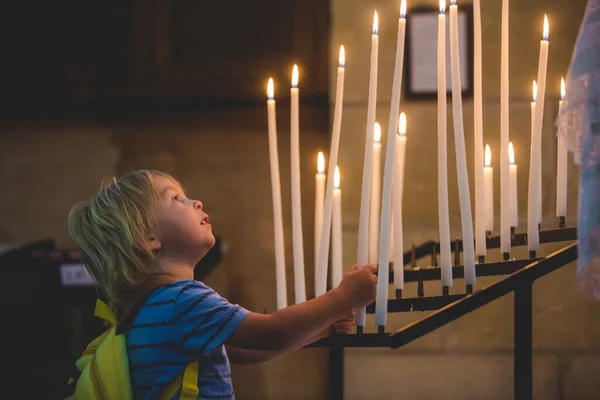 Little Toddler Boy Praying Chapel Candles Front Him — Stock Photo, Image