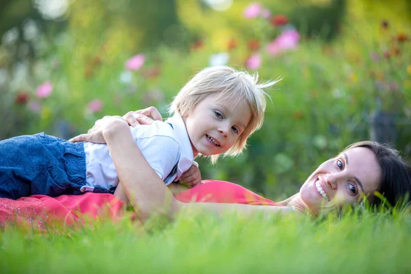 Mother Cute Blond Child Boy Lying Grass Hugging Enjoying Tender — Stock Photo, Image