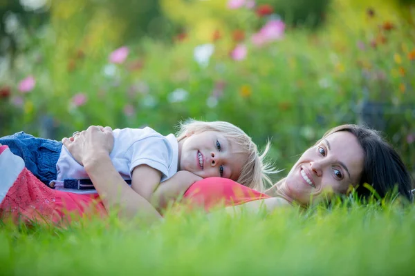 Mother Cute Blond Child Boy Lying Grass Hugging Enjoying Tender — Stock Photo, Image