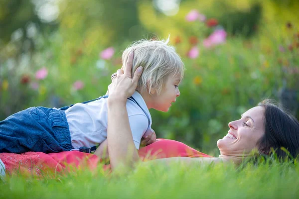 Mother Cute Blond Child Boy Lying Grass Hugging Enjoying Tender — Stock Photo, Image