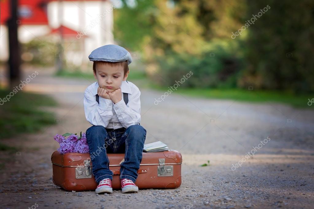 Little boy with suitcase and map traveling Stock Photo t.tomsickova 67862675