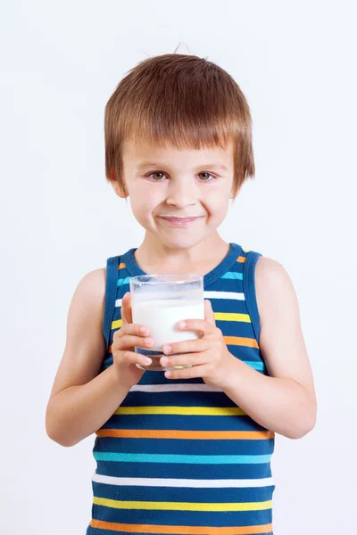 Cute little boy, drinking milk, holding glass of milk, mustaches — Stock Photo, Image