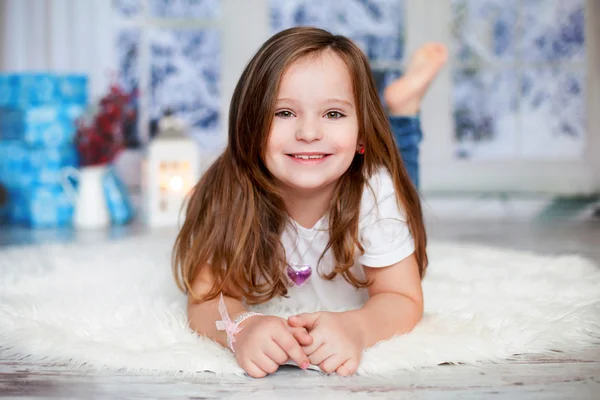Beautiful winter close portrait of little preschool girl at home — Stock Photo, Image