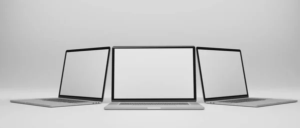白い背景に隔離されたモックアップ画面を持つ3台のコンピュータのラップトップ 3Dレンダリング 3Dイラスト — ストック写真