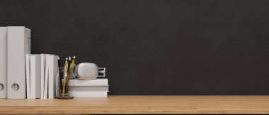 Modern çalışma alanı tasarımında arkaplan, markalarınız için tahta masa, beyaz kâğıt, kitaplar, kulaklık ve siyah duvar, 3D görüntüleme, 3D resim