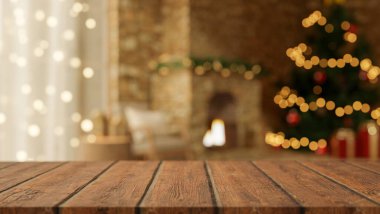 Boş ahşap tezgah masası bulanık Noel ağacının üzerinde ve rahat oturma odasındaki şöminenin üzerinde. Ürün Ekranı, 3D Görünüm, 3B Görüntü.