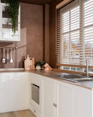 Kahverengi boyalı duvarı ve güneşliklerin altında beyaz yemek tezgahı olan modern bir mutfak. Mutfak İçi, 3D görüntüleme, 3D resimleme.