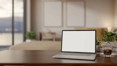 Boş ekran dizüstü bilgisayar, kahve ve demlik, ahşap masa, oturma odası ya da ofisin yanındaki pencere kenarında. Çalışma ya da öğrenim, 3B canlandırma, 3B İllüstrasyon.