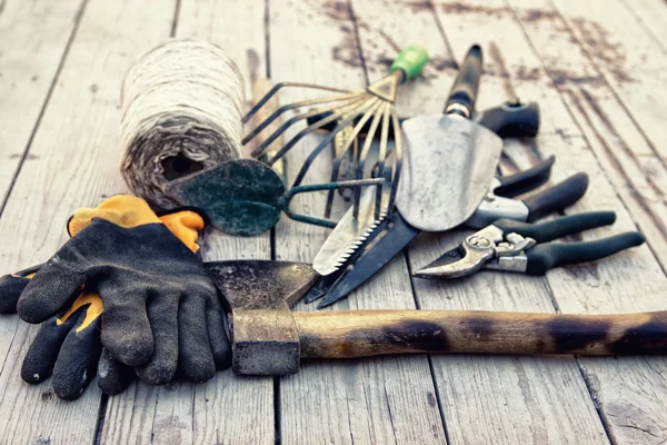 Gardening Tools with Gloves on Wooden Background — Stock Photo, Image