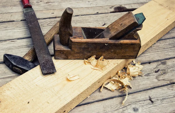 Carpentry Tools on Wooden Board — Stock Photo, Image