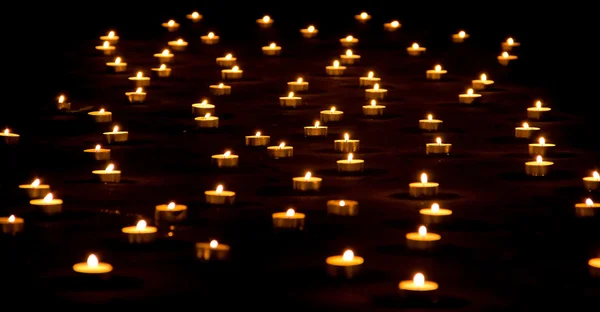 Lot of Candles on Ground — Stock Photo, Image
