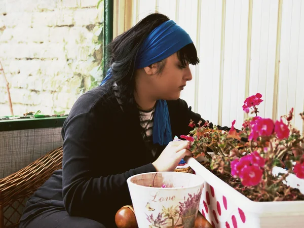 Woman is Sowing Flowers — Stock Photo, Image