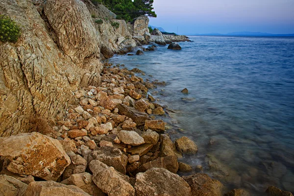 Tramonto Acque sotterranee sulla costa croata — Foto Stock