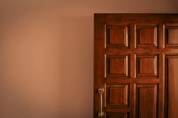 Polished and designer wooden main door of an apartment in a building