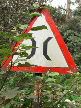Indian road cautionary sign indicating narrow bridge ahead. Indicates the driver about a narrow bridge on the road ahead.