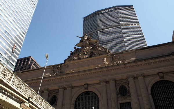 Glory of Commerce, a sculptural group by Jules-Felix Coutan, with the clock, on the southern facade of Grand Central Terminal, New York, NY, USA - August 18, 2020
