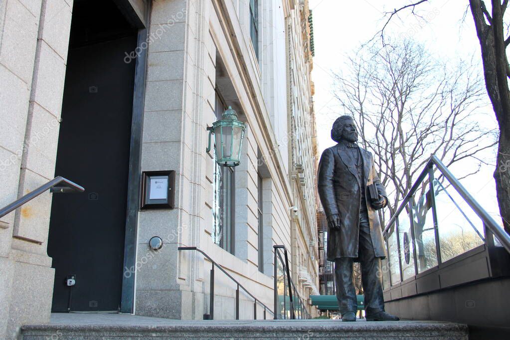 Frederick Douglass statue on the steps of New York Historical Society building, at the W 77th Street entrance, New York, NY, USA - March 13, 2021