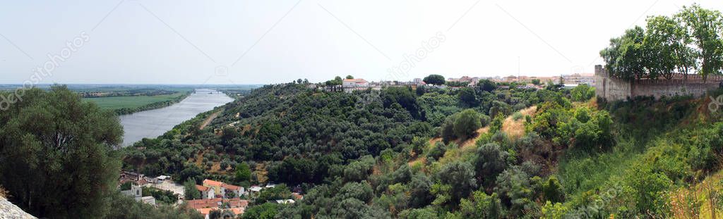 Panoramic view toward Portas do Sol from Sao Bento Viewpoint, Tagus River on the left, Santarem, Portugal - July 11, 2021