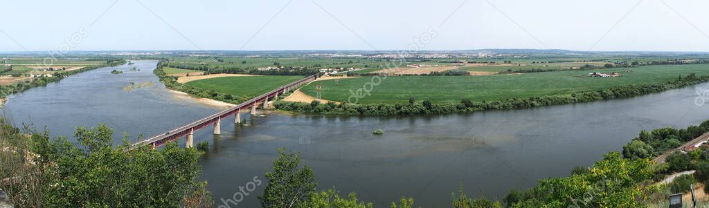 Tagus River, view of the bridge Dom Luis I from Portas do Sol, panoramic shot toward Alentejo, Santarem, Portugal - July 11, 2021