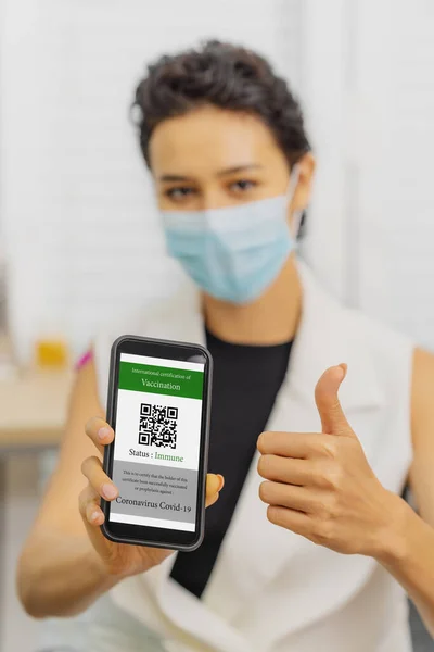 digital coronavirus covid-19 vaccination certificate with QR code in smartphone application as vaccine passport for patient who has already got vaccination in full dose