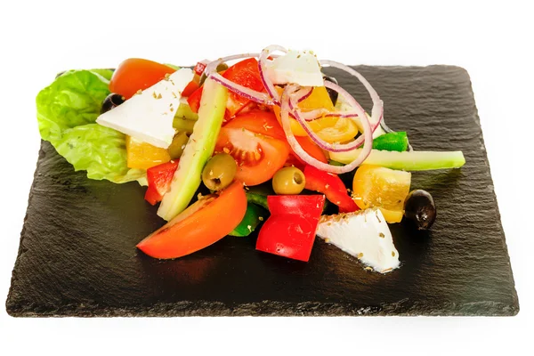 Griekse groente salade met feta of geitenkaas. — Stockfoto