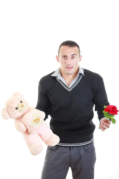 Romantischer junger Mann mit Geschenken zum Valentinstag — Stockfoto