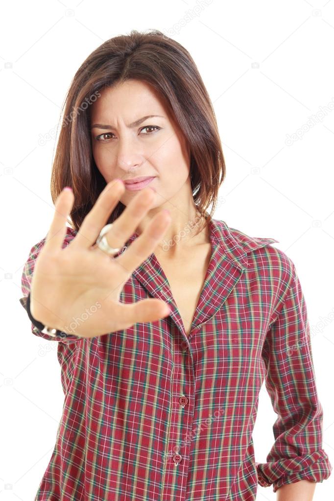 Stop gesture with indignation showed by young pretty woman