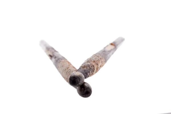 Closeup of used and worn-out drum sticks for drums insolated on — Stock Photo, Image