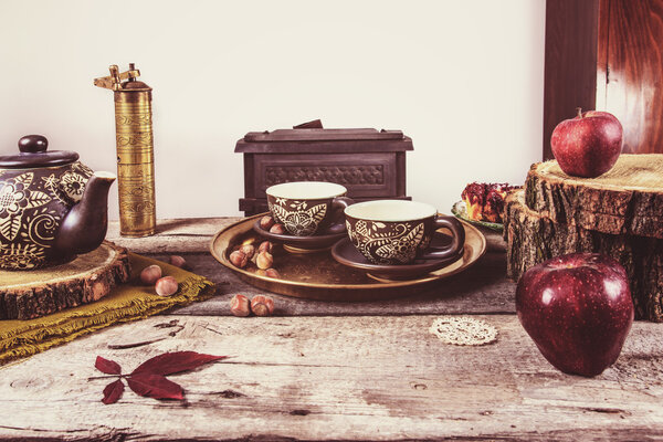 Old retro kitchen table with vintage tea pottery