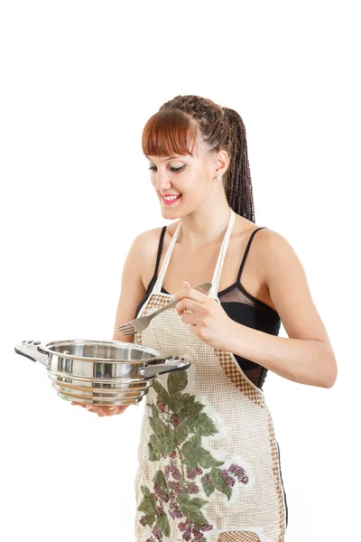 Proud cook with pot in the kitchen wearing apron — Stock Photo, Image