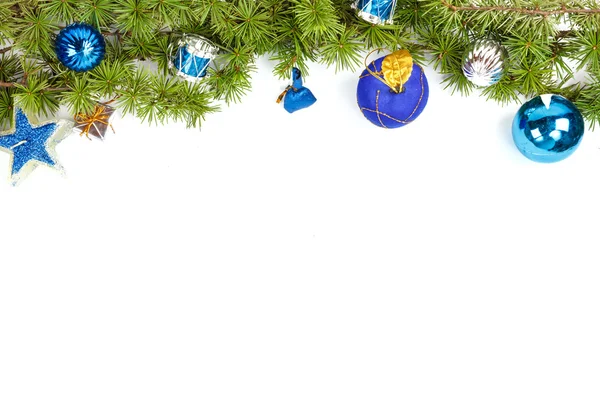 Christmas decoration with blue ornamentals and green fir tree — Stock Photo, Image