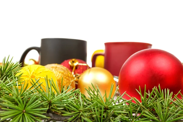 Decoration with pine or fir and many yellow and red ornaments ba — Stock Photo, Image