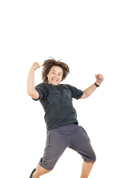 Ragazzo sorridente con espressione del viso e saltando in nero scuro t-shi — Foto Stock