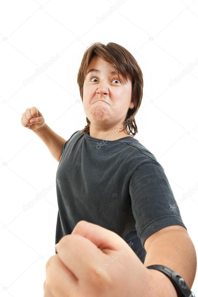  chubby child kid or boy angry and aggressive in fight gesturing